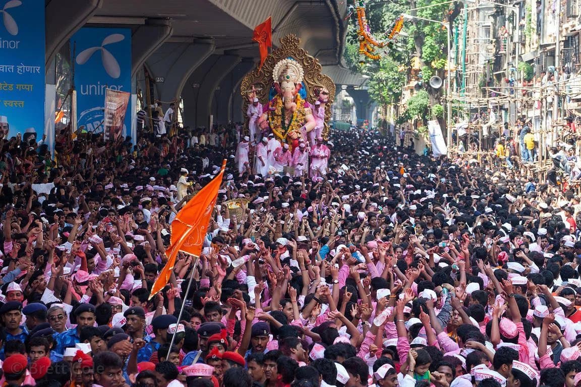 Artists performing during a Ganesh Utsav celebration in Mumbai